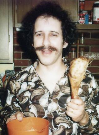 A Polaroid of Larry with a turkey leg